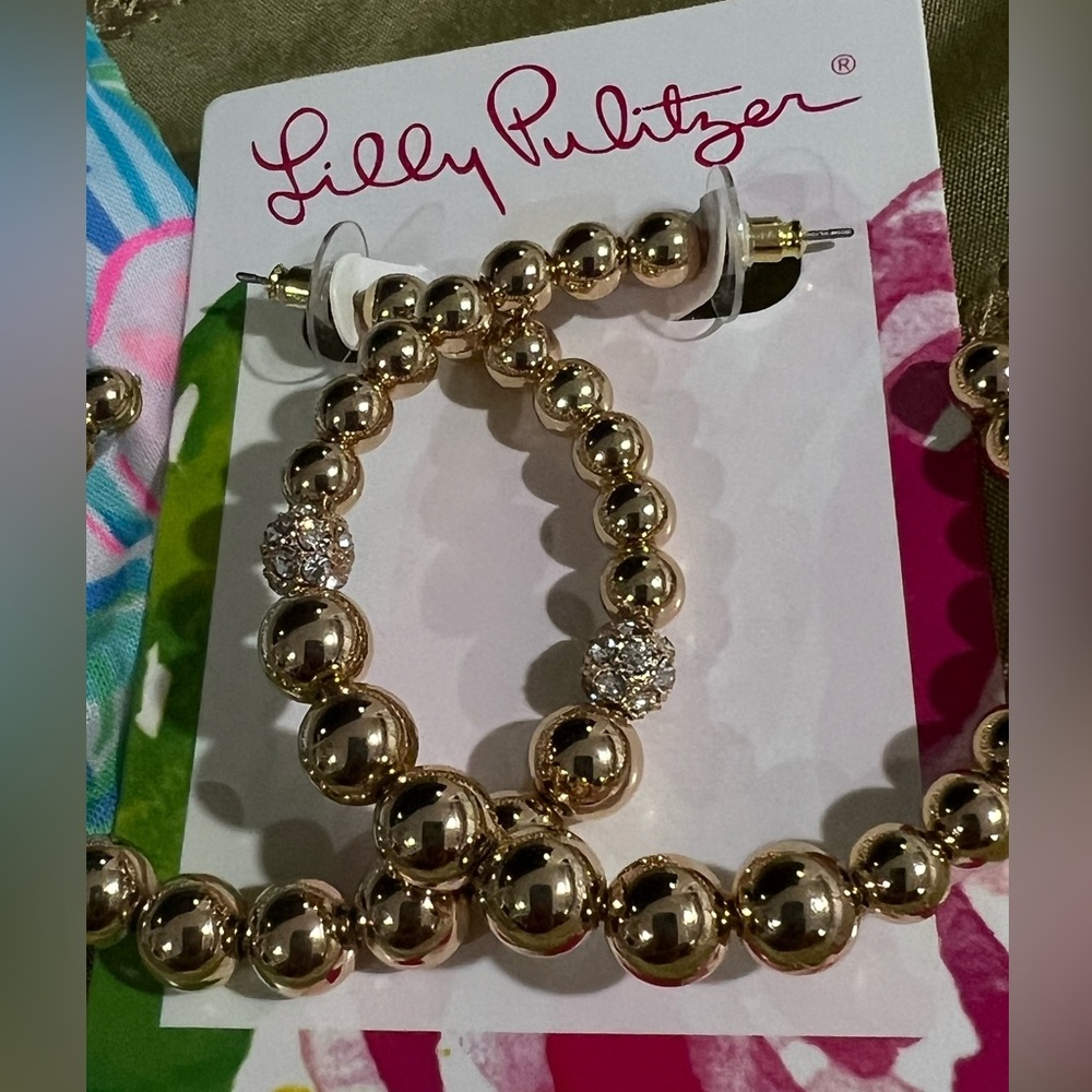 Lilly Putlitzer new earrings. Gold beaded with stones in middle.